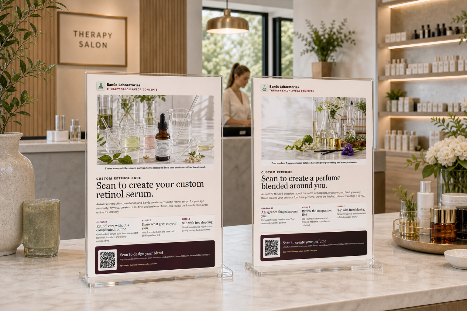Custom skincare and perfume Banús posters displayed in clear acrylic stands at Therapy Salon